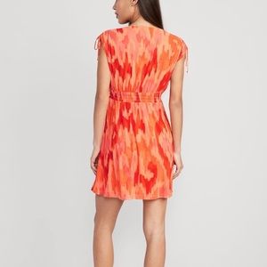 Waist-defined Sleeveless tie-shoulder smocked mesh mini dress